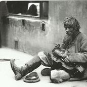3. Нищий на тротуаре в Москве. Фотография 1900-х годов.
